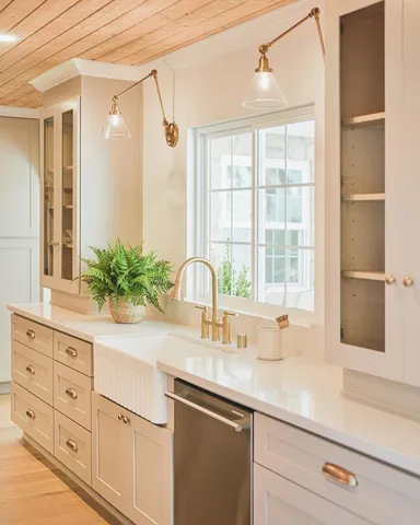 a kitchen with a stove and a sink