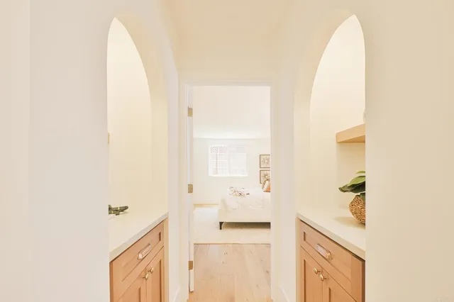 a bathroom with a bathtub and a sink