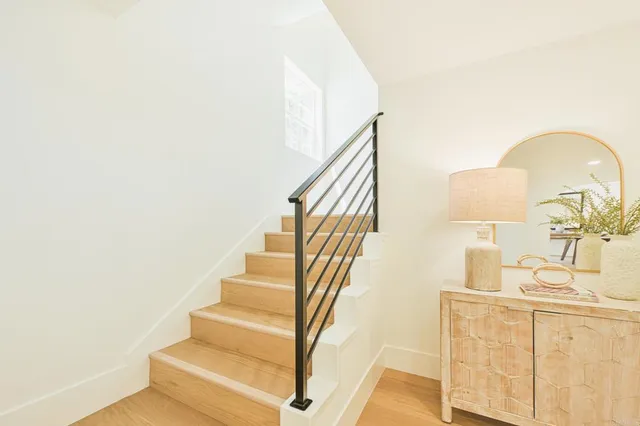 an aerial view of residential building and trees around