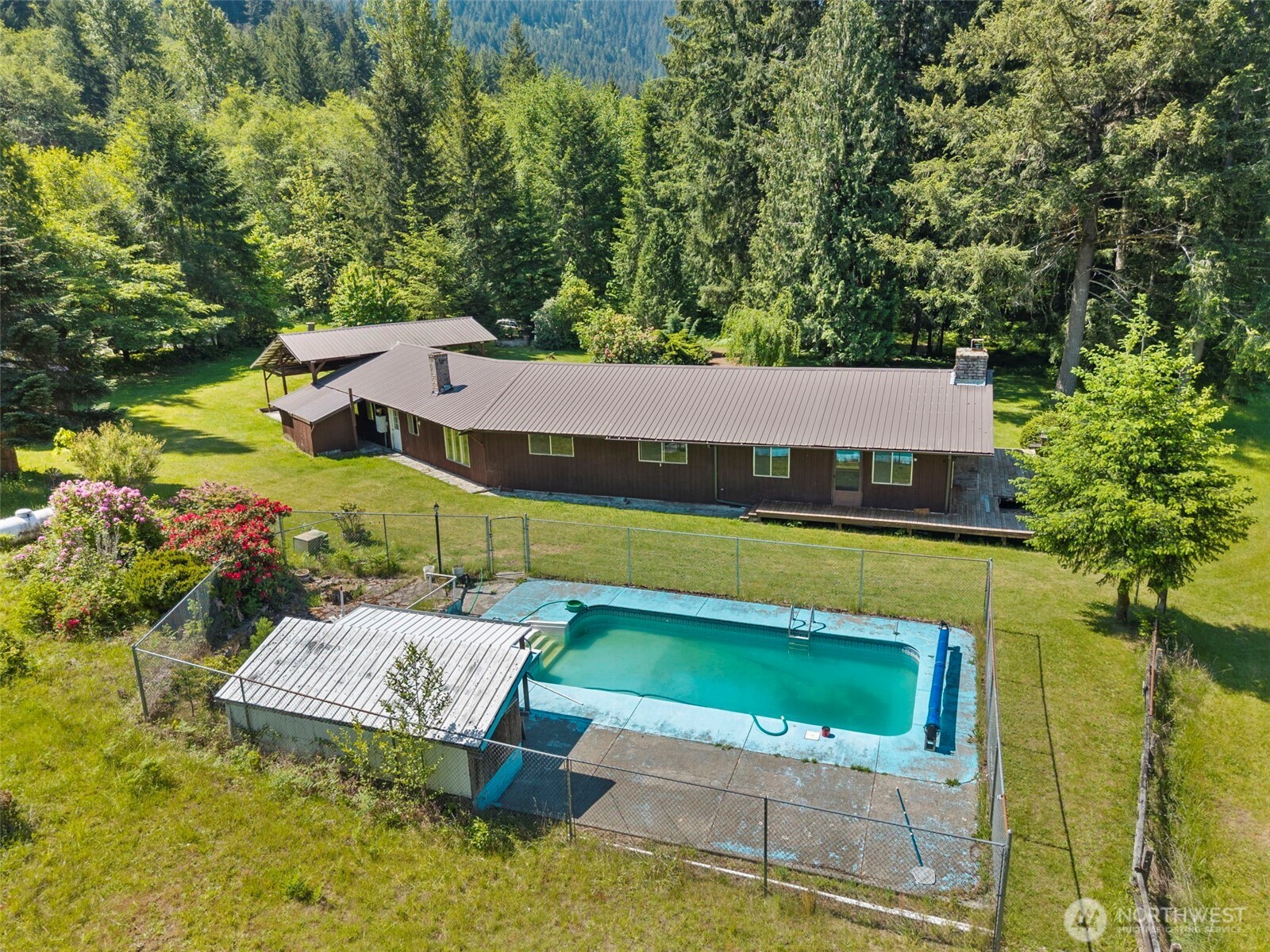 155 Bonell Road Randle, WA 98377 - Photo 31 of 38 an aerial view of a house with swimming pool garden and patio