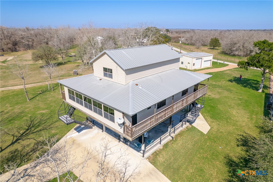 564 Cypress Valley Road Cuero, TX 77954 - Photo 1 of 33 an aerial view of a house with a ocean view
