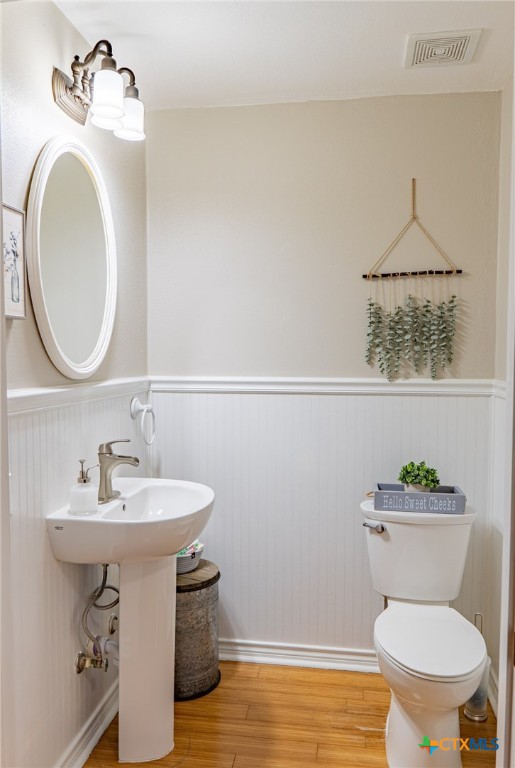 564 Cypress Valley Road Cuero, TX 77954 - Photo 25 of 33 a bathroom with a toilet sink and mirror