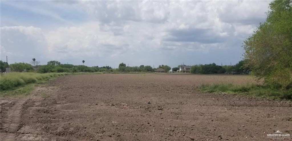0 Baker Drive Weslaco, TX 78596 - Photo 1 of 1 a view of a lake with houses in the back