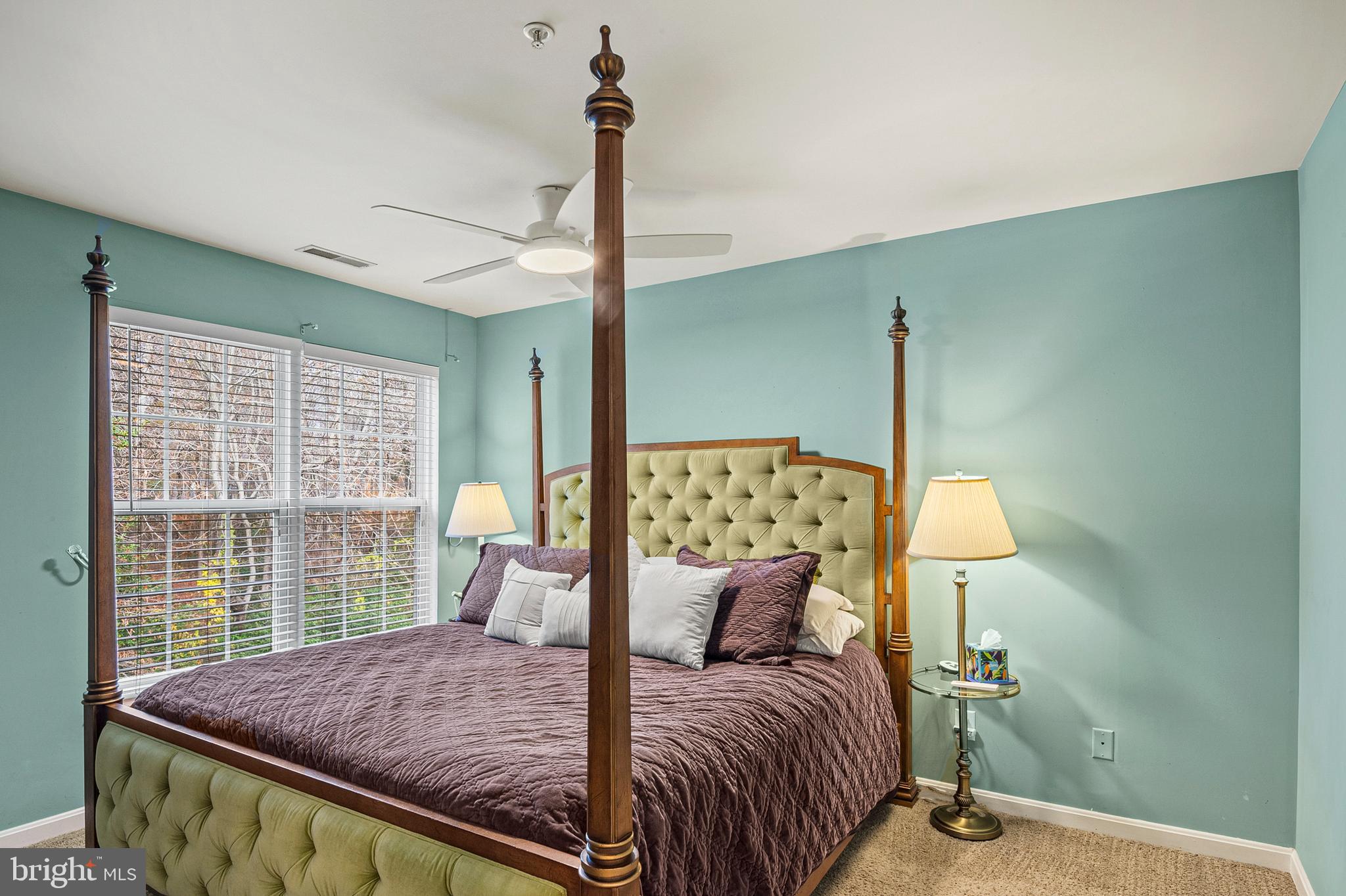 222 Gray Fox Court Edgewater, MD 21037 - Photo 14 of 42 a bedroom with a bed window and lamp