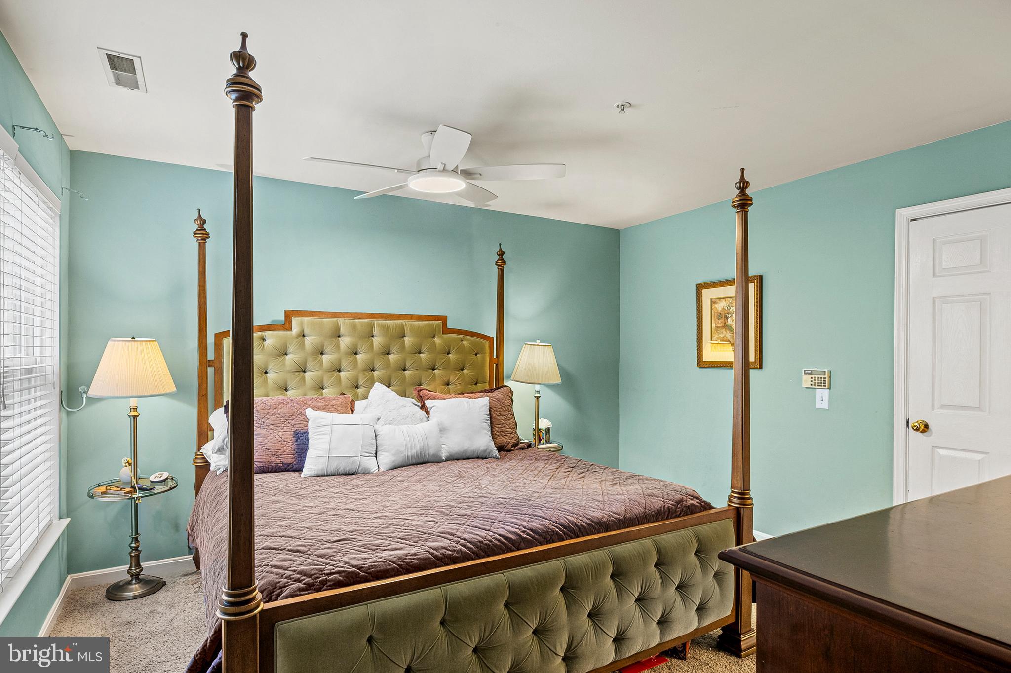 222 Gray Fox Court Edgewater, MD 21037 - Photo 15 of 42 a bedroom with a bed and a table