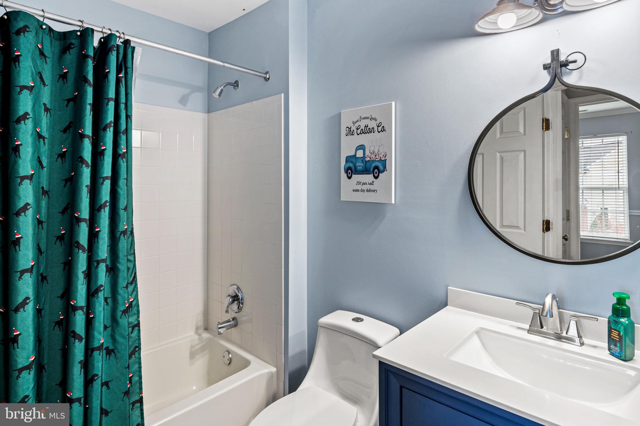 222 Gray Fox Court Edgewater, MD 21037 - Photo 20 of 42 a bathroom with a sink toilet and a mirror