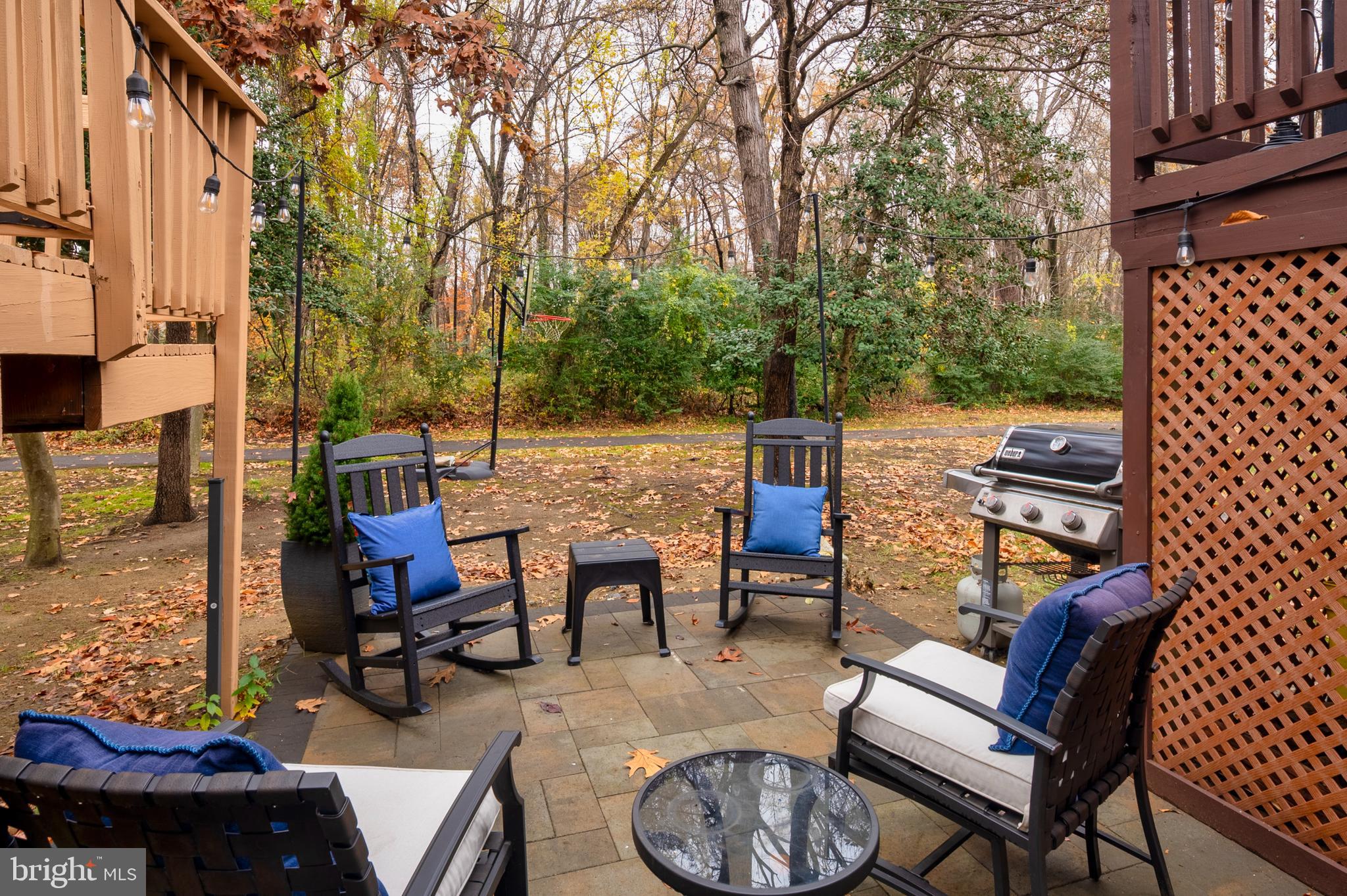 222 Gray Fox Court Edgewater, MD 21037 - Photo 25 of 42 a view of a patio with table and chairs and potted plants