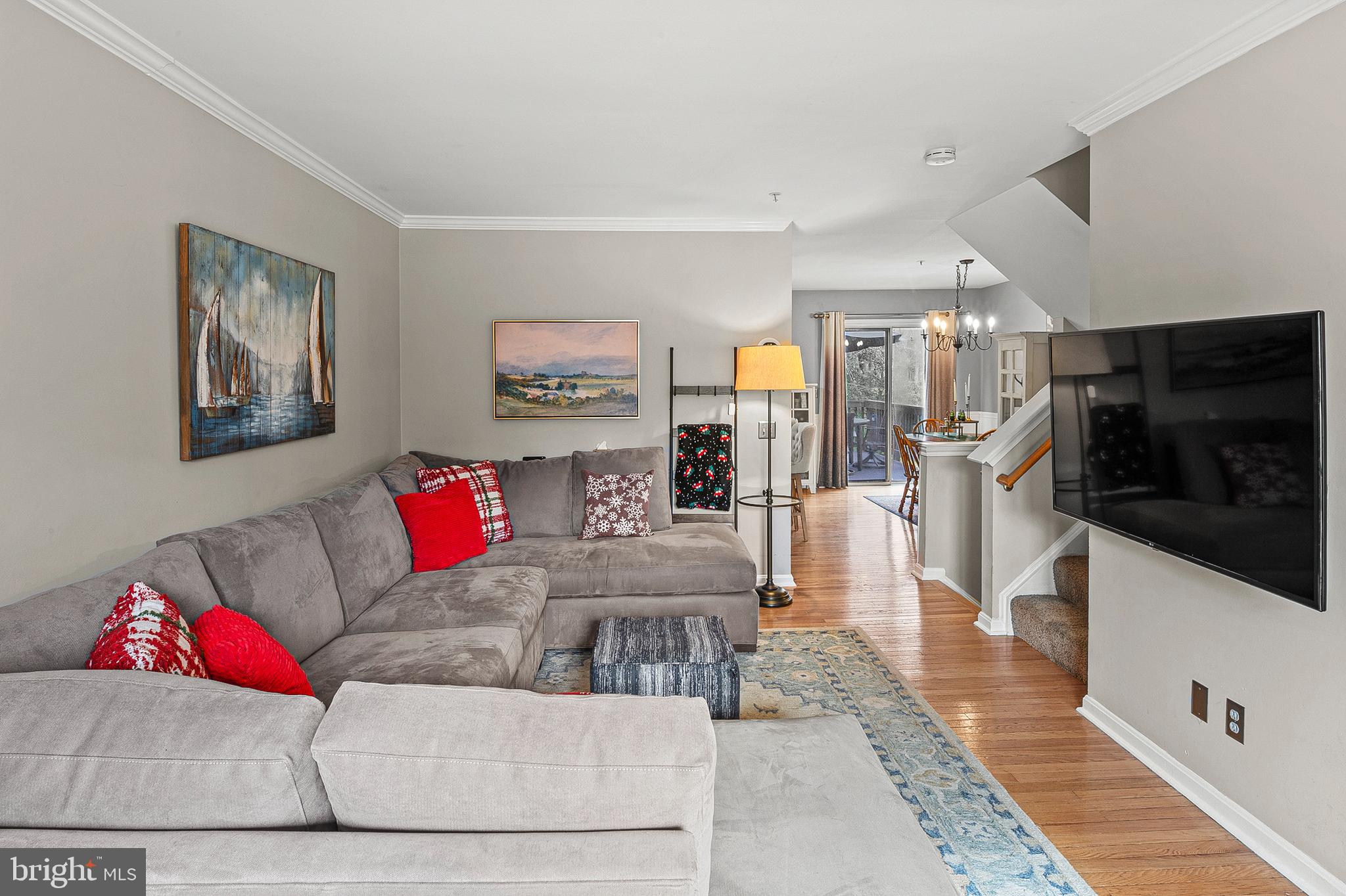 222 Gray Fox Court Edgewater, MD 21037 - Photo 9 of 42 a living room with furniture and a flat screen tv