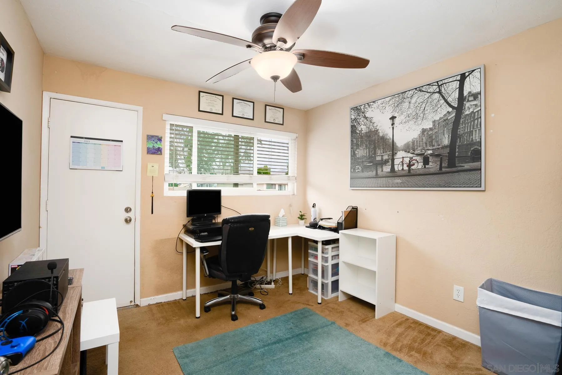10007 Great Rock Road Santee, CA 92071 - Photo 13 of 26 a view of a workspace with furniture and a window