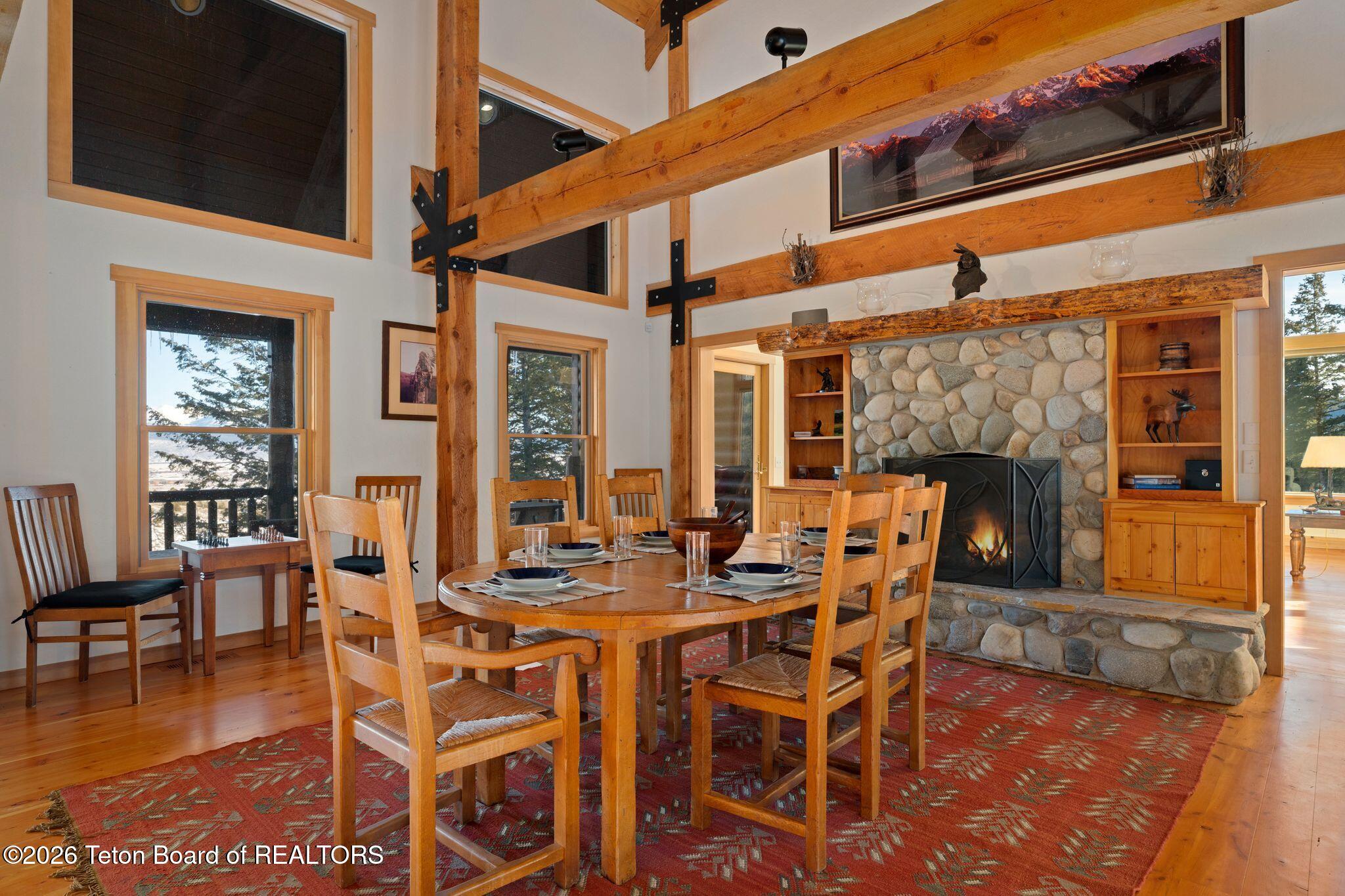 5450 Dry Henderson Road Victor, ID 83455 - Photo 16 of 40 Dining Area + Fireplace