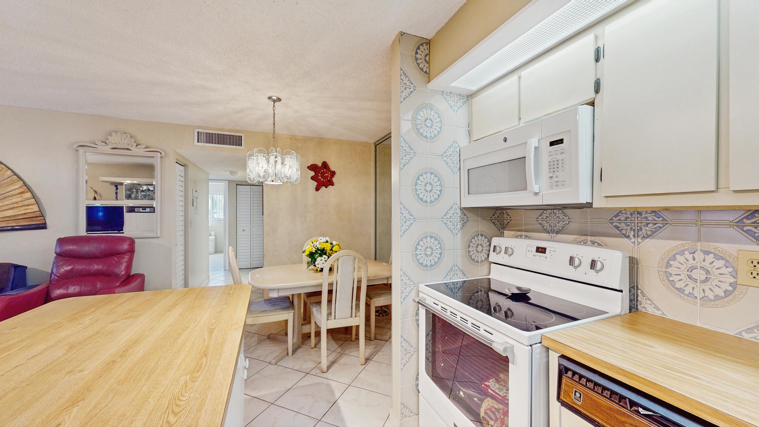 9765 West McNab Road, Unit 115 Tamarac, FL 33321 - Photo 10 of 25 view of kitchen and dining