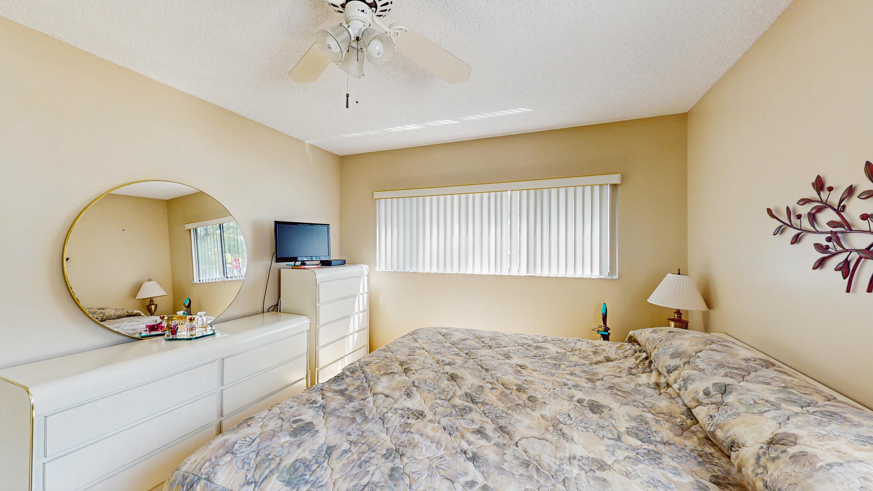 9765 West McNab Road, Unit 115 Tamarac, FL 33321 - Photo 12 of 25 primary bedroom view 2