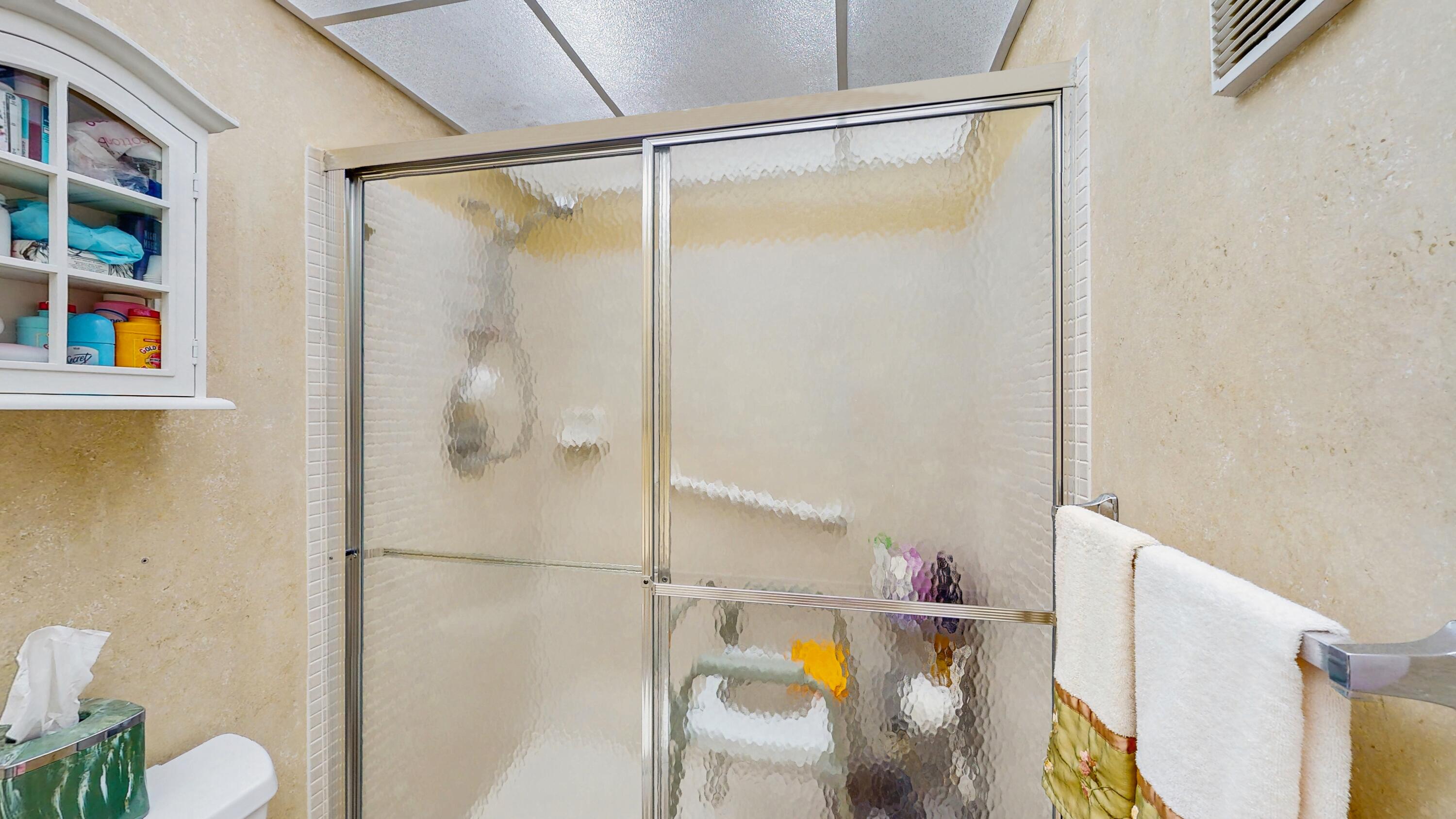 9765 West McNab Road, Unit 115 Tamarac, FL 33321 - Photo 14 of 25 primary bath shower