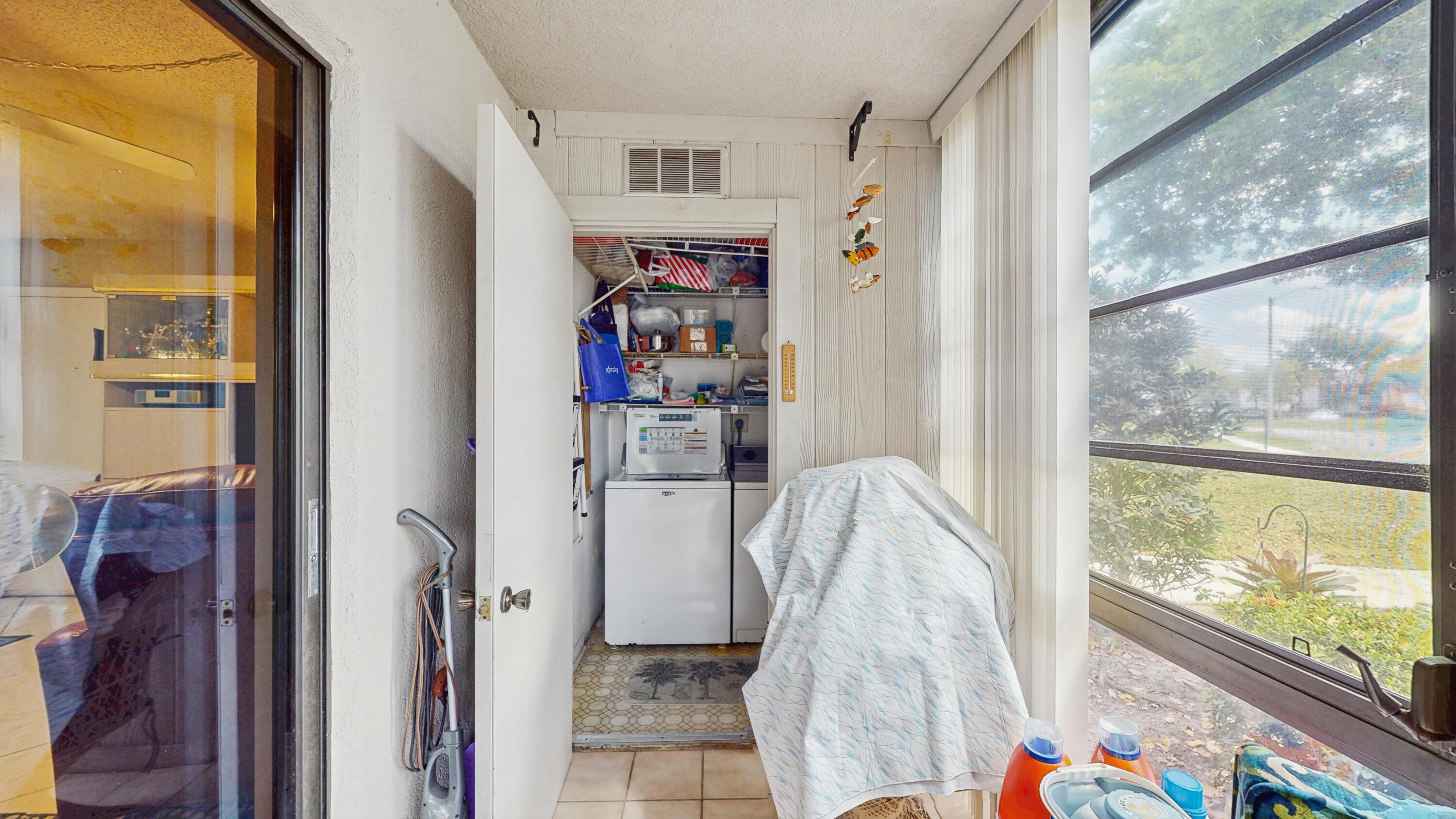 9765 West McNab Road, Unit 115 Tamarac, FL 33321 - Photo 21 of 25 view of washer and drier