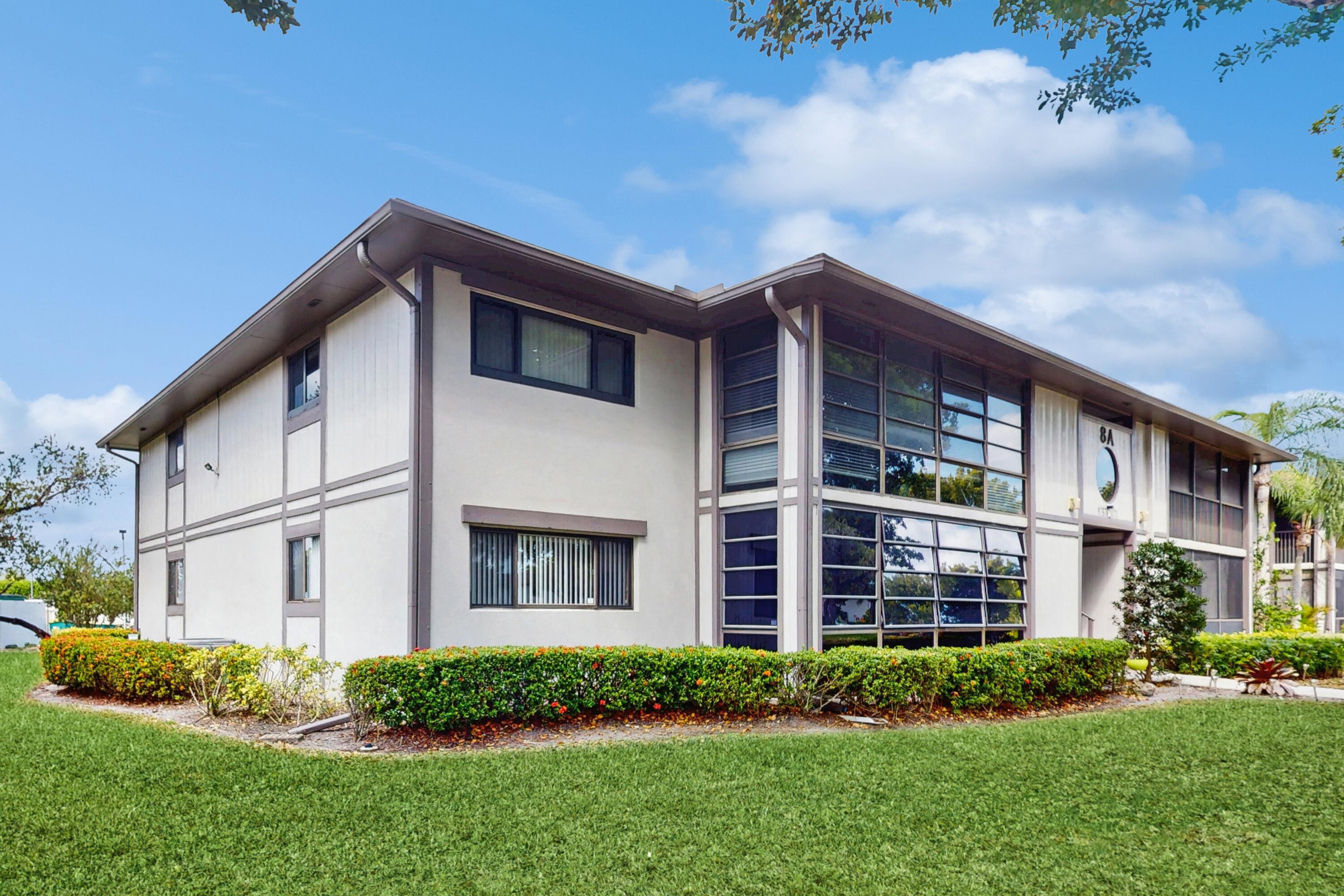9765 West McNab Road, Unit 115 Tamarac, FL 33321 - Photo 24 of 25 corner 1st floor unit outside
