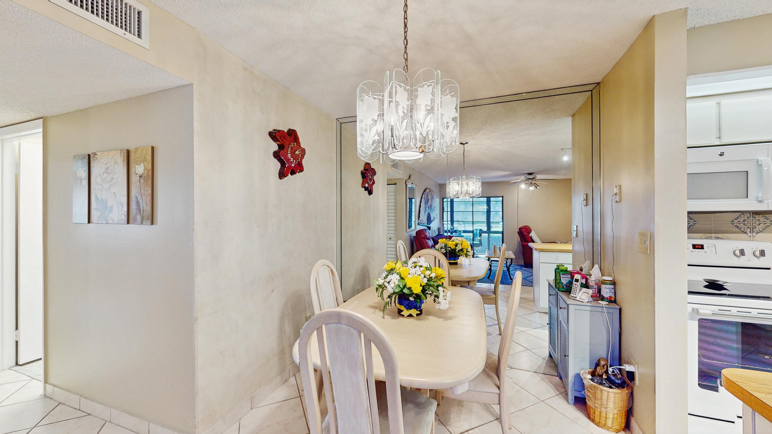 9765 West McNab Road, Unit 115 Tamarac, FL 33321 - Photo 5 of 25 dining area
