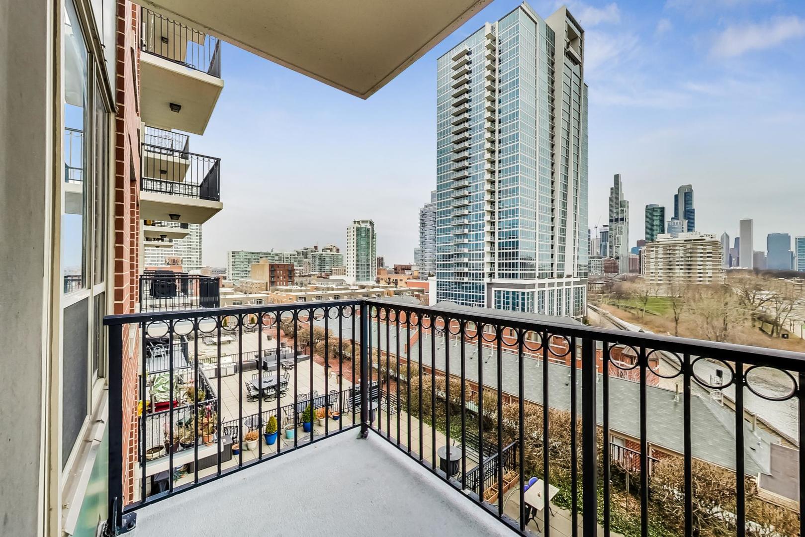 1717 South Prairie Avenue, Unit 802 Chicago, IL 60616 - Photo 7 of 33 a view of city from a balcony