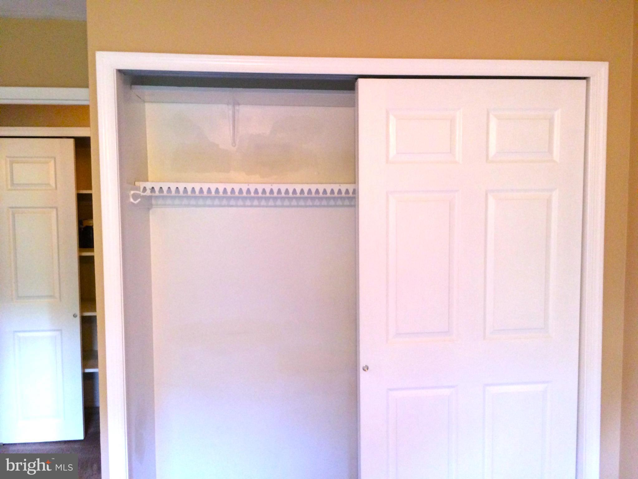 250 Ridge Pike, Unit CONDO 349 Lafayette Hill, PA 19444 - Photo 12 of 16 Spacious bedroom closet with sliding doors.