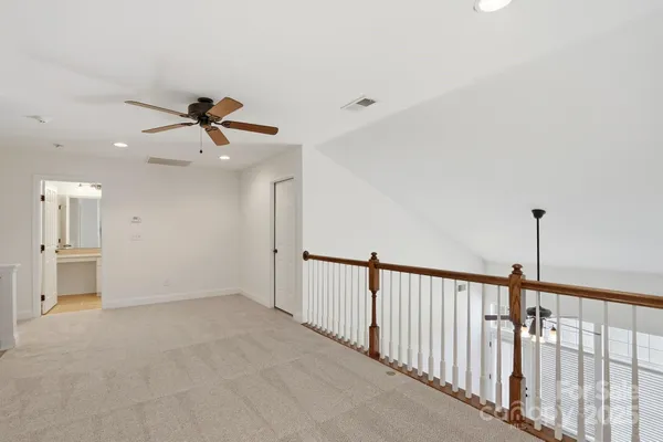a view of a livingroom with a ceiling fan