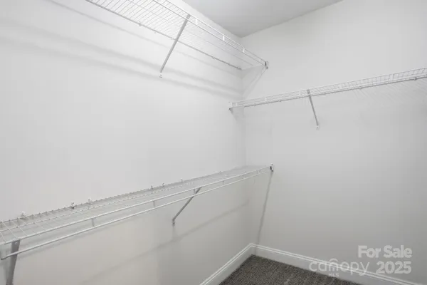 a view of a room with racks on the wall