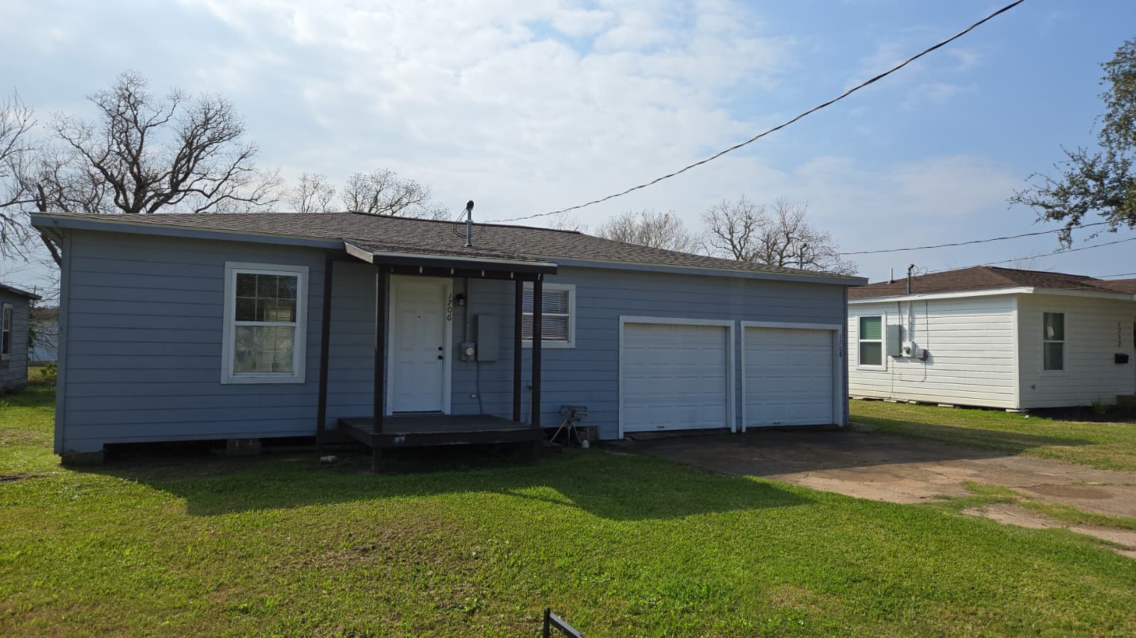 1708 West 5th Street Freeport, TX 77541 - Photo 4 of 9 a view of a house with a backyard