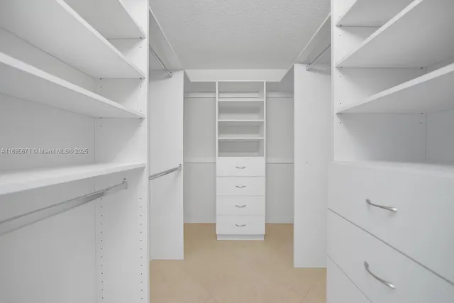 a bed room with a bed and a window