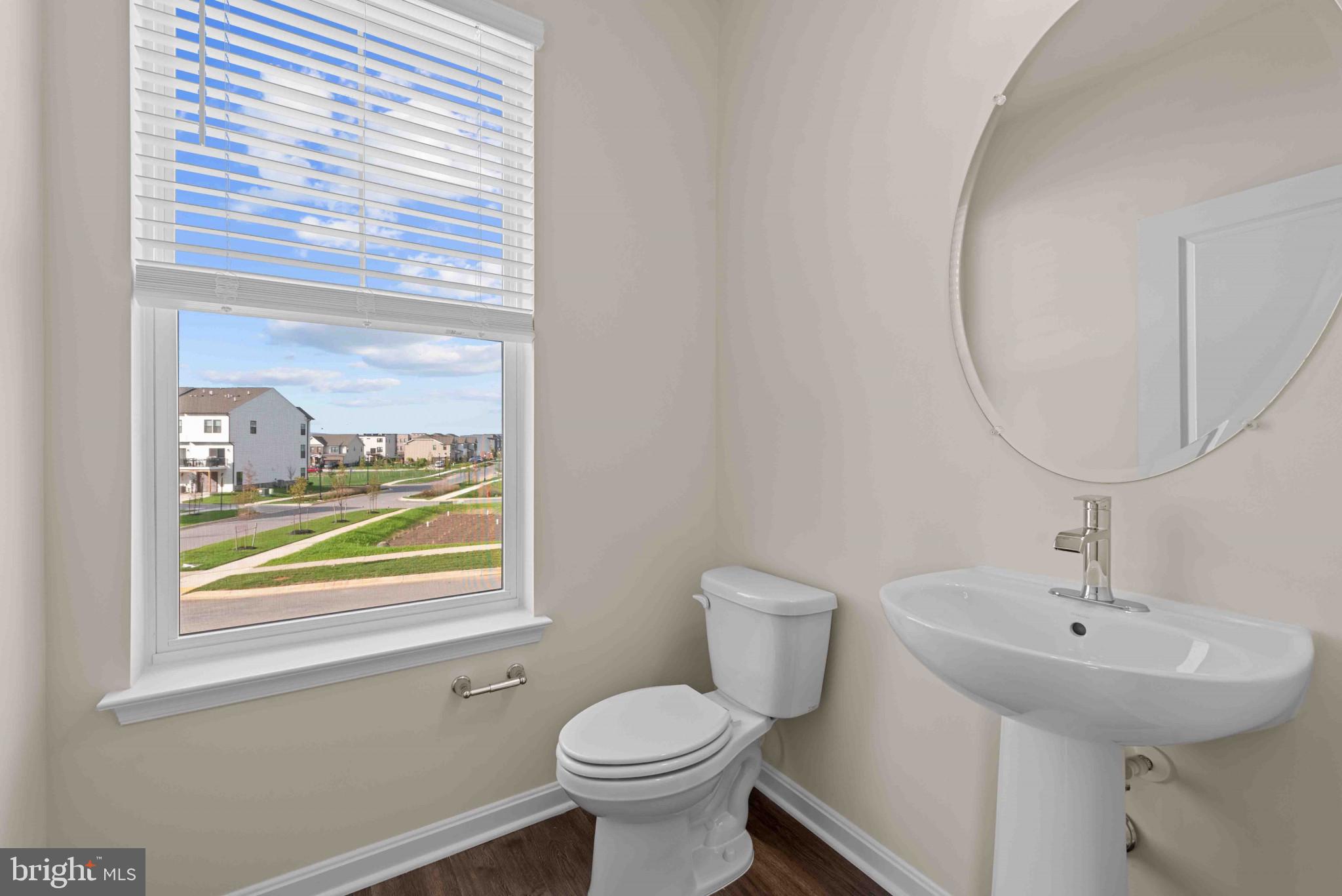 377 Ensemble Way Frederick, MD 21701 - Photo 18 of 45 a bathroom with a sink and a toilet