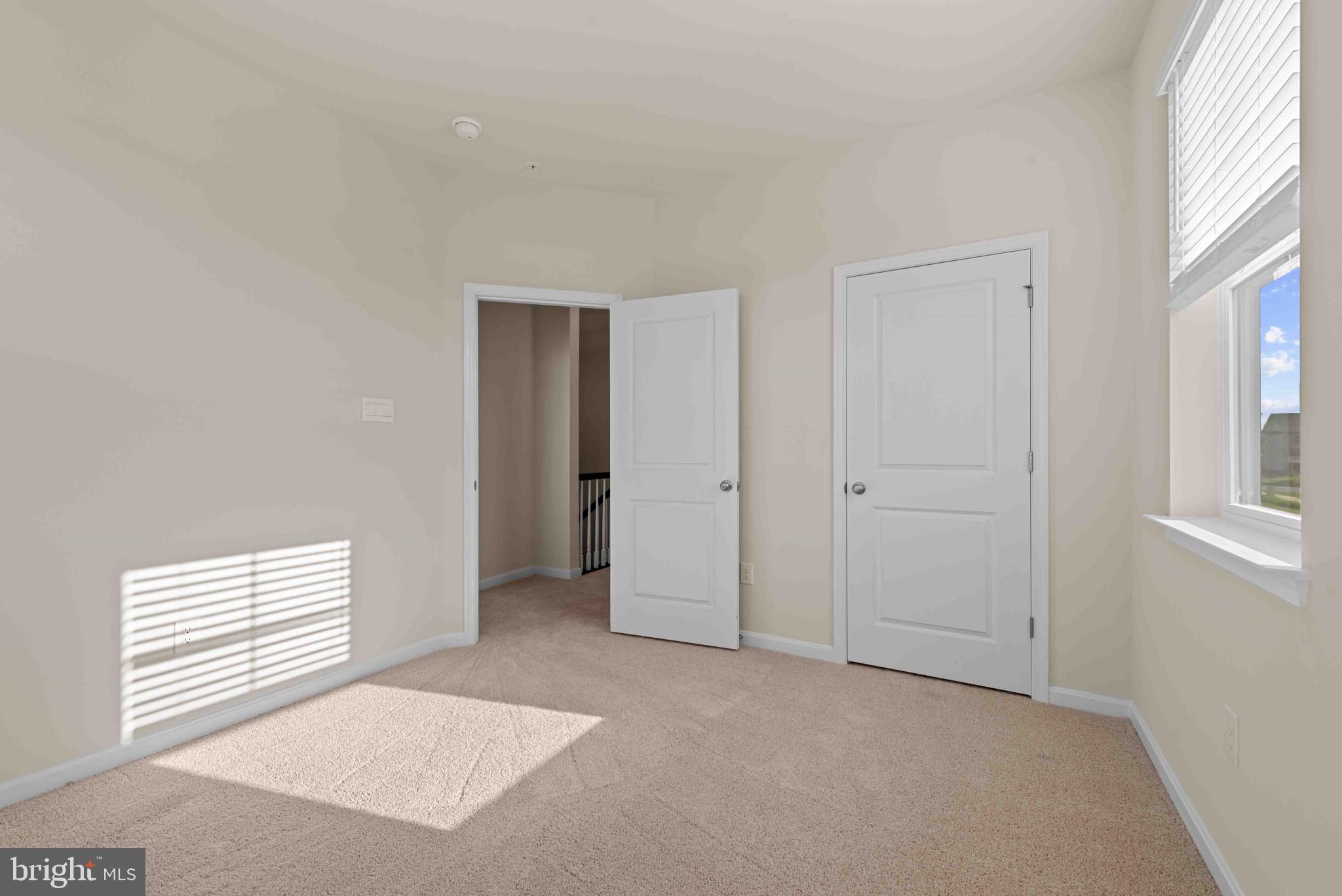 377 Ensemble Way Frederick, MD 21701 - Photo 20 of 45 an empty room with windows