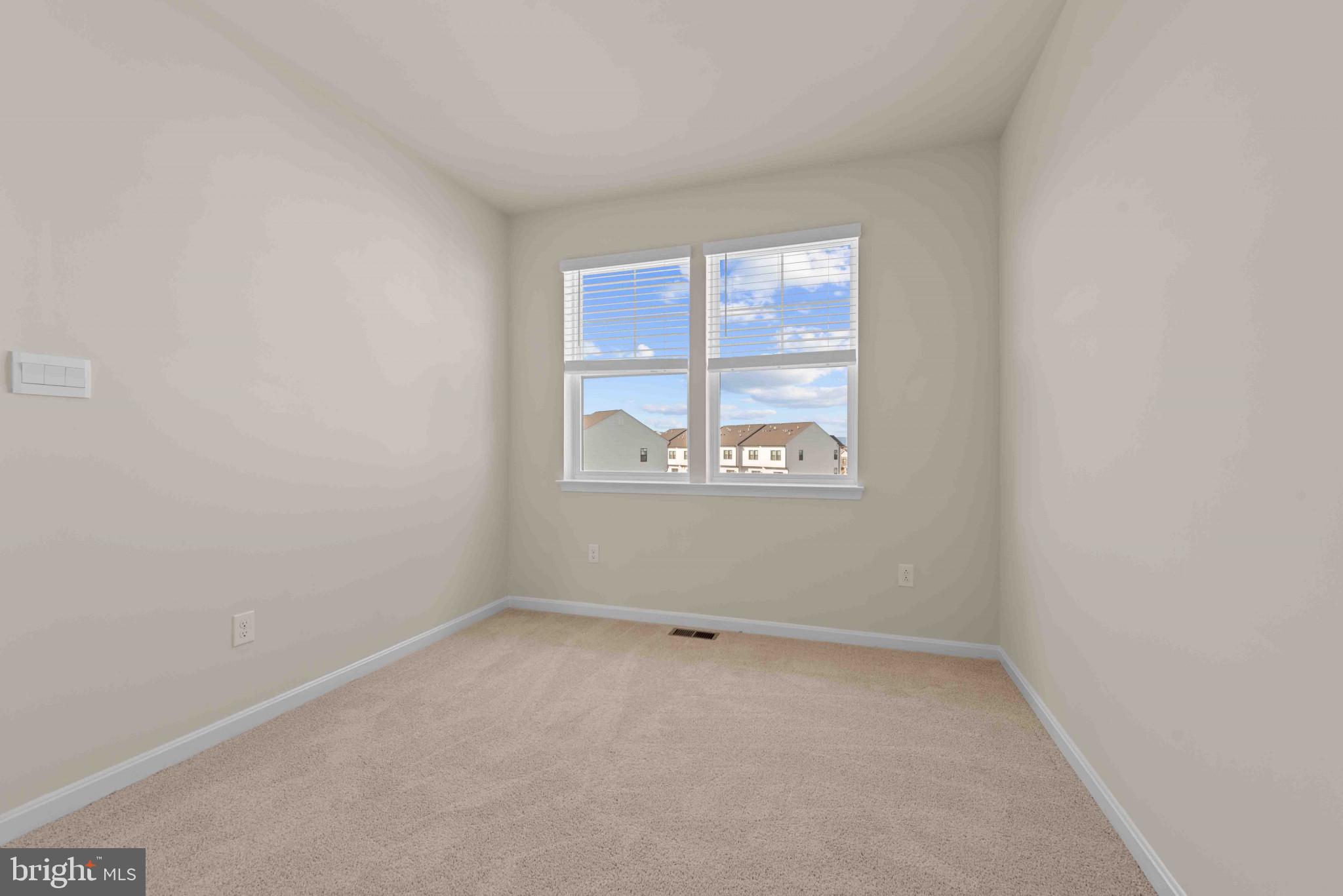 377 Ensemble Way Frederick, MD 21701 - Photo 24 of 45 an empty room with a window