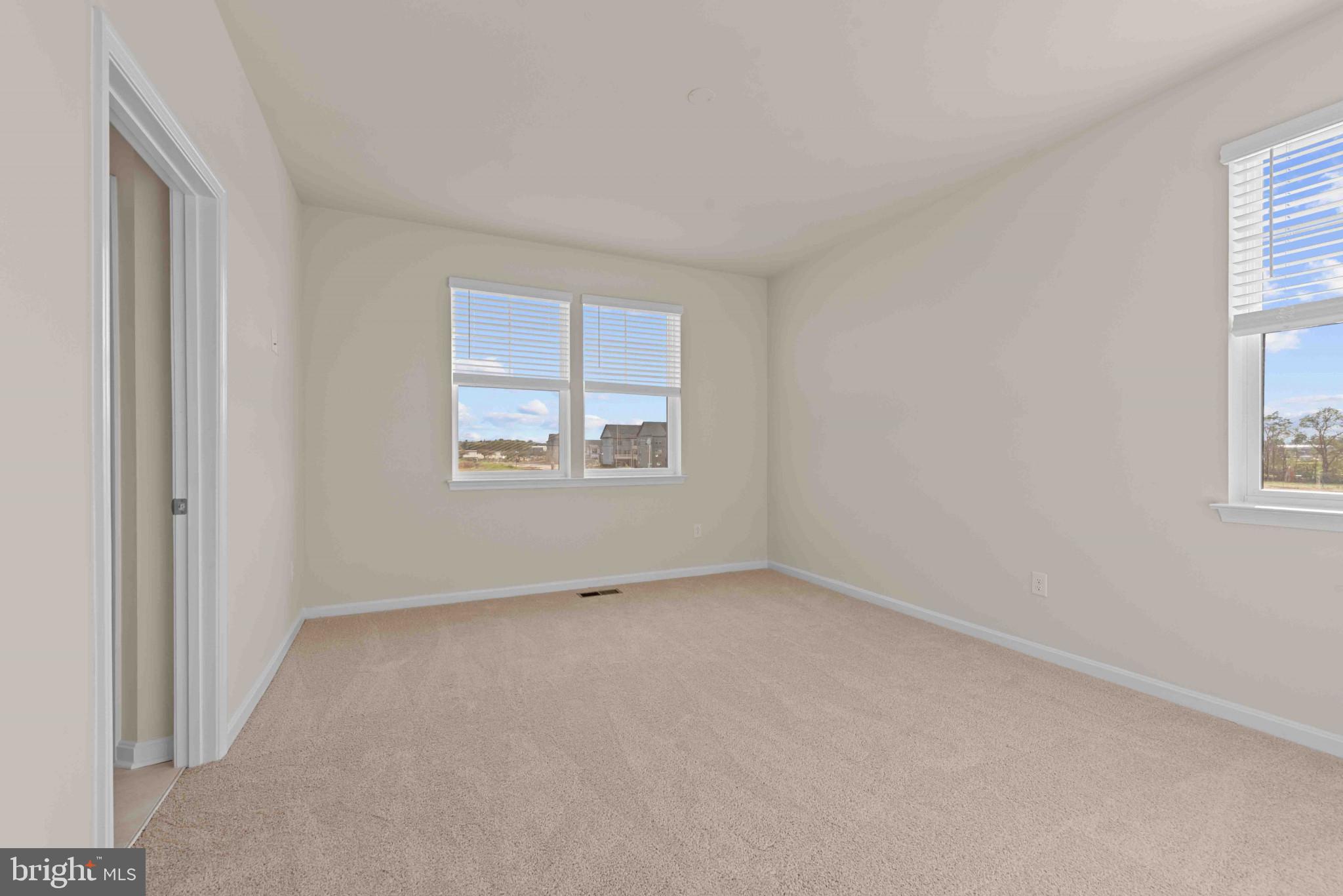 377 Ensemble Way Frederick, MD 21701 - Photo 26 of 45 an empty room with windows