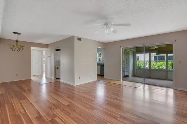 a view of an entryway with wooden floor