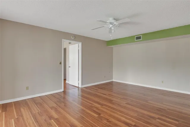 a bathroom with a sink toilet and a mirror