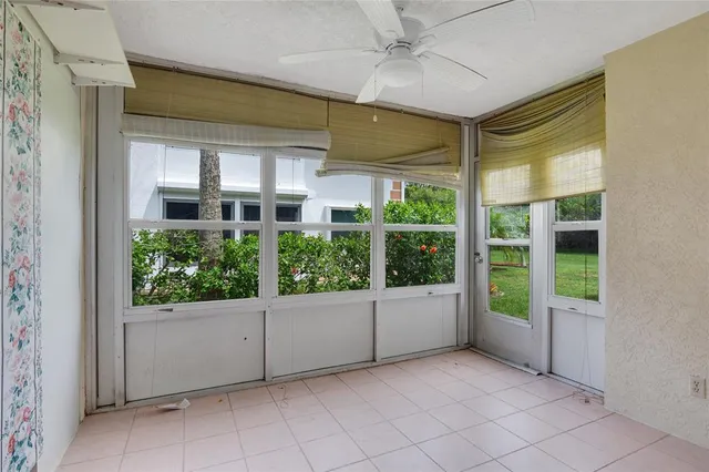 a view of a back yard from a porch