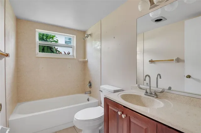 an aerial view of a house with a garden