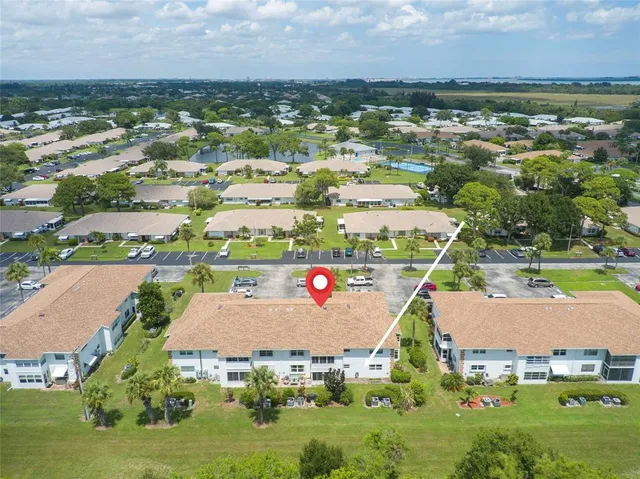 an aerial view of a city with lots of residential buildings