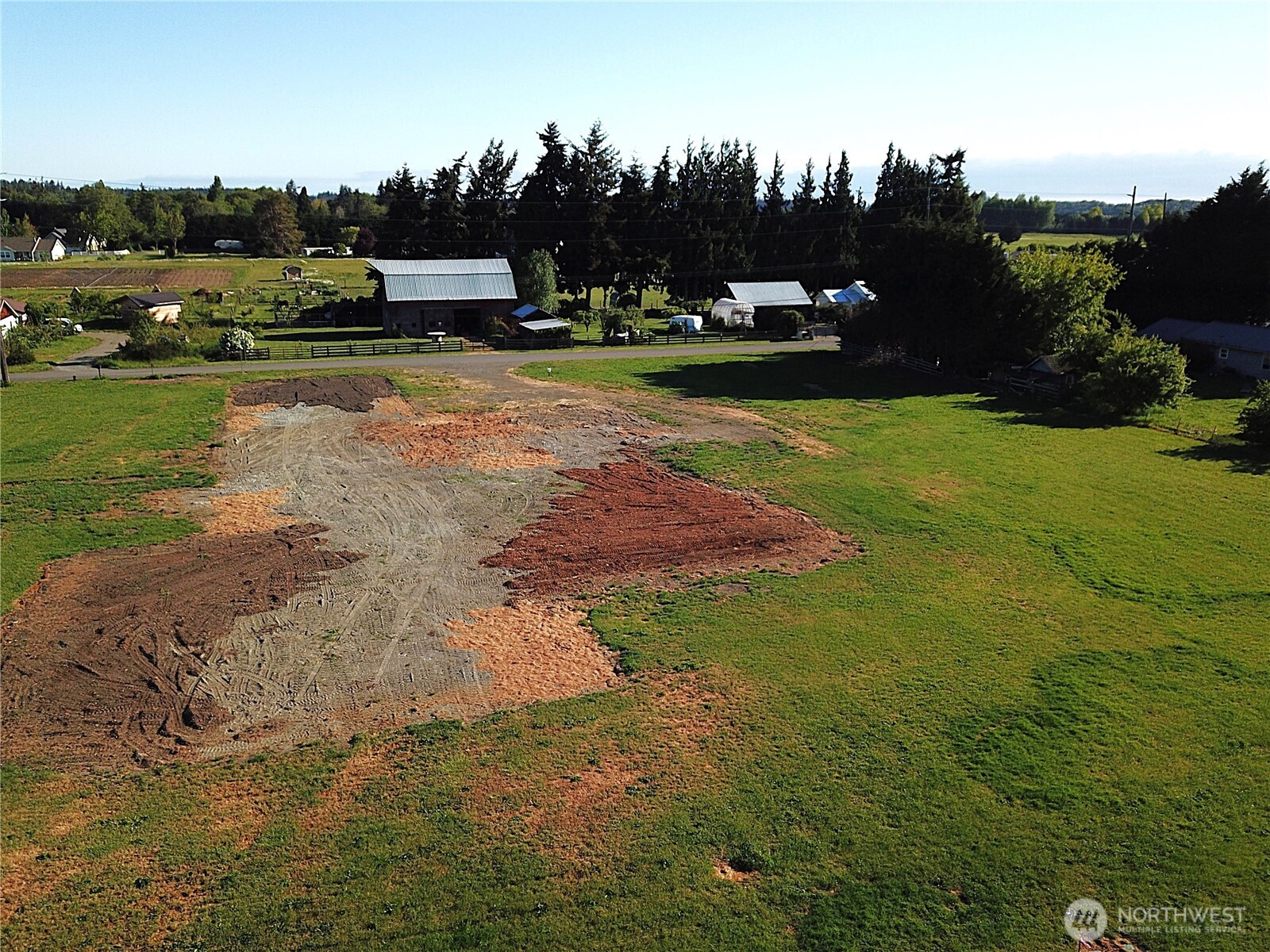 9999 Macleay Road Sequim, WA 98382 - Photo 13 of 16 a view of a park with large trees