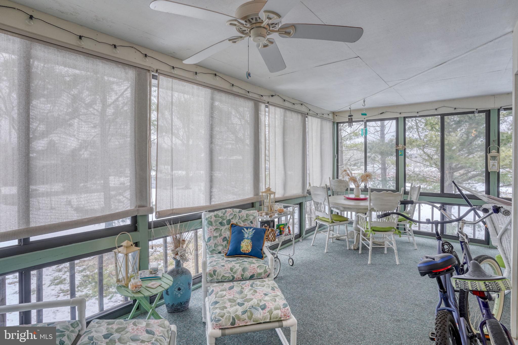 18488 Belle Grove Road, Unit 3 Lewes, DE 19958 - Photo 24 of 48 a view of a dining room with furniture window and outside view