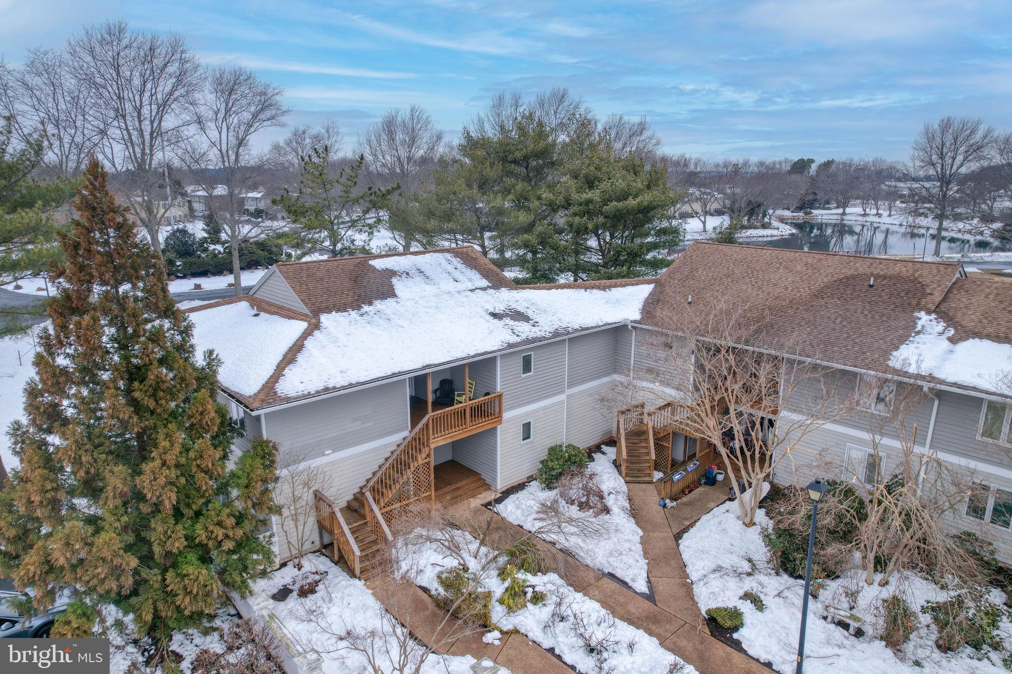 18488 Belle Grove Road, Unit 3 Lewes, DE 19958 - Photo 3 of 48 a view of a patio in a backyard