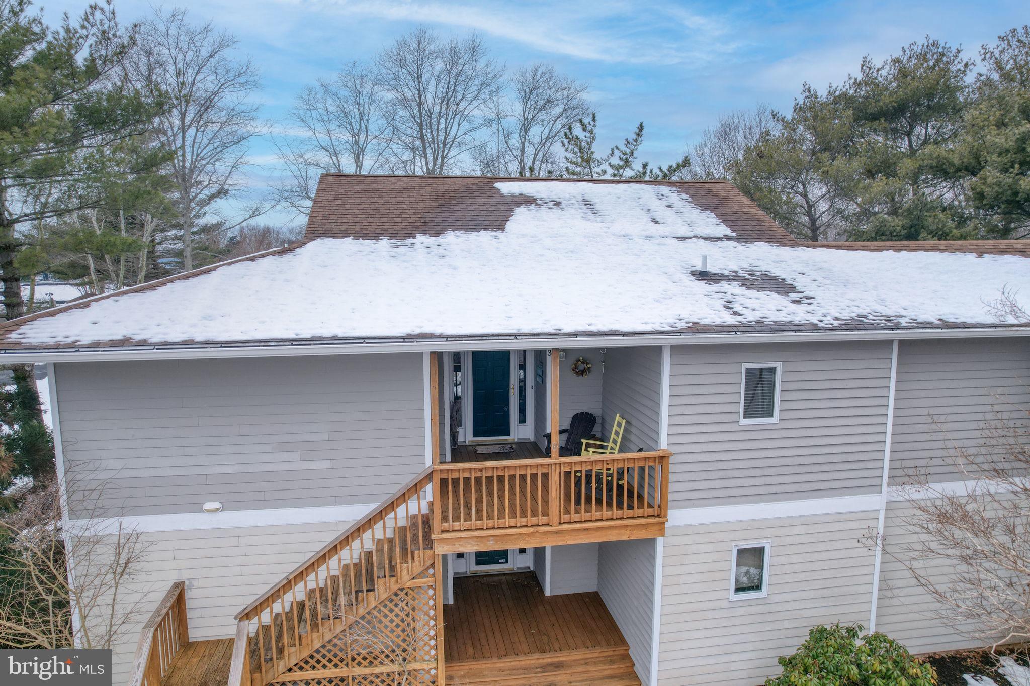 18488 Belle Grove Road, Unit 3 Lewes, DE 19958 - Photo 4 of 48 a view of a house with a balcony