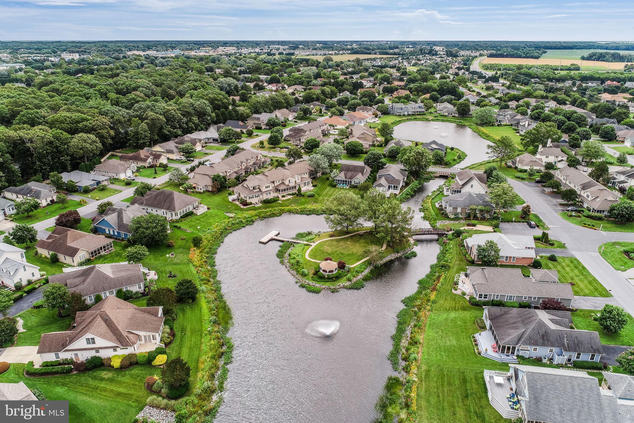 18488 Belle Grove Road, Unit 3 Lewes, DE 19958 - Photo 47 of 48 an aerial view of residential houses with outdoor space