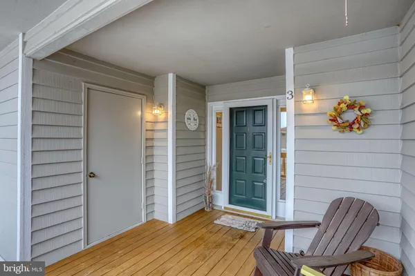 a view of outdoor space deck and hallway