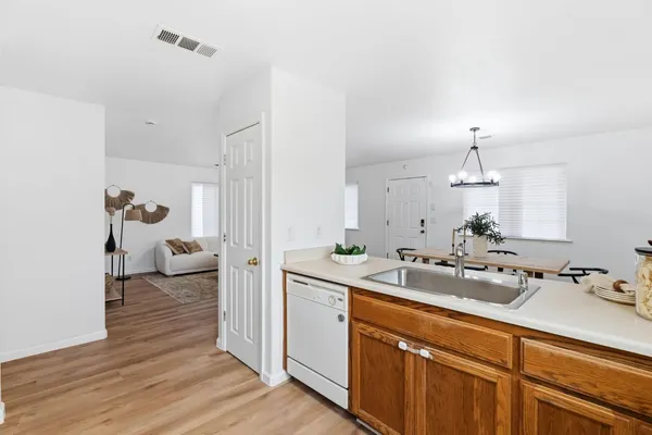 a en suite bathroom with double sink and a mirror