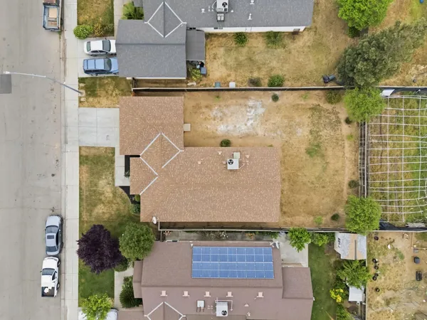 an aerial view of residential house with outdoor space