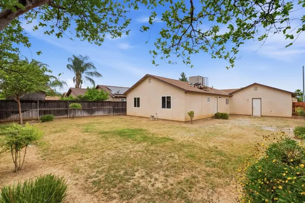 a house view with a garden space