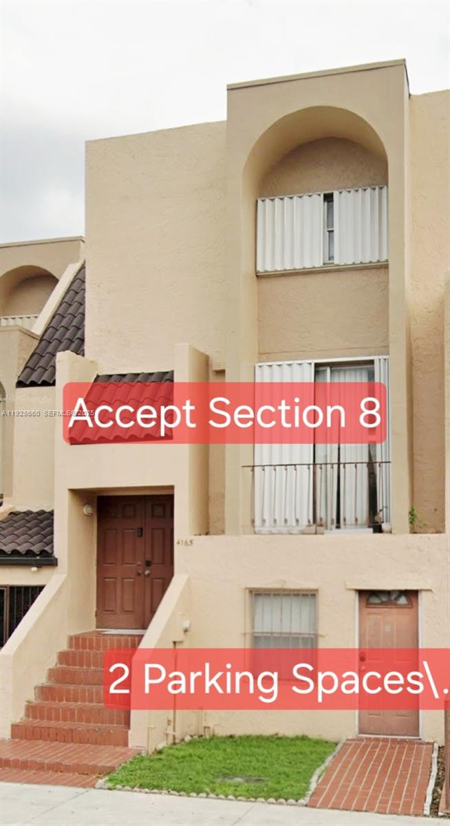 4165 West 11th Lane, Unit 14 Hialeah, FL 33012 - Photo 1 of 1 a sign that is on the wall of building