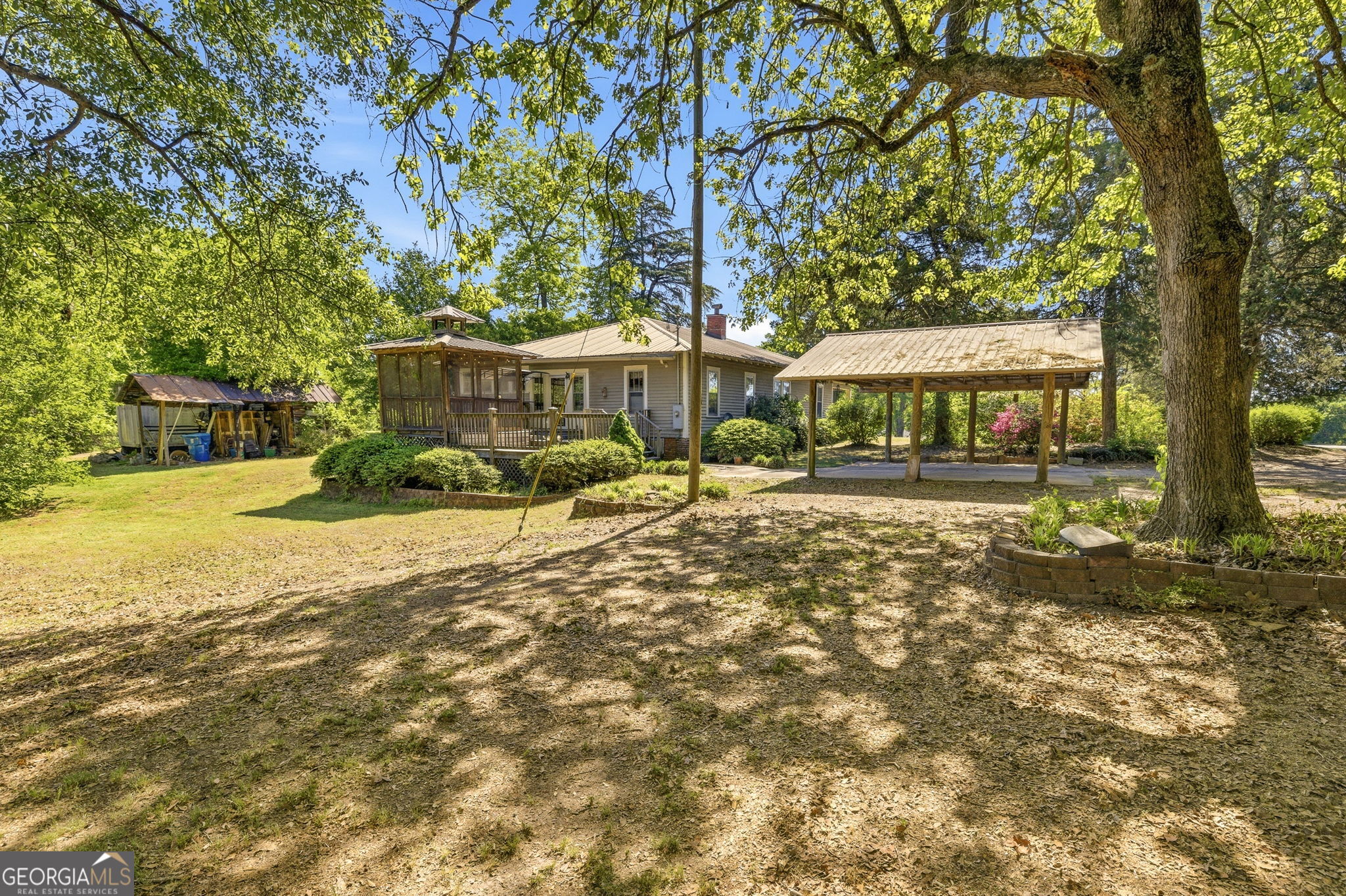 3213 Highway 326 Commerce, GA 30530 - Photo 28 of 40 a view of outdoor space with garden and trees