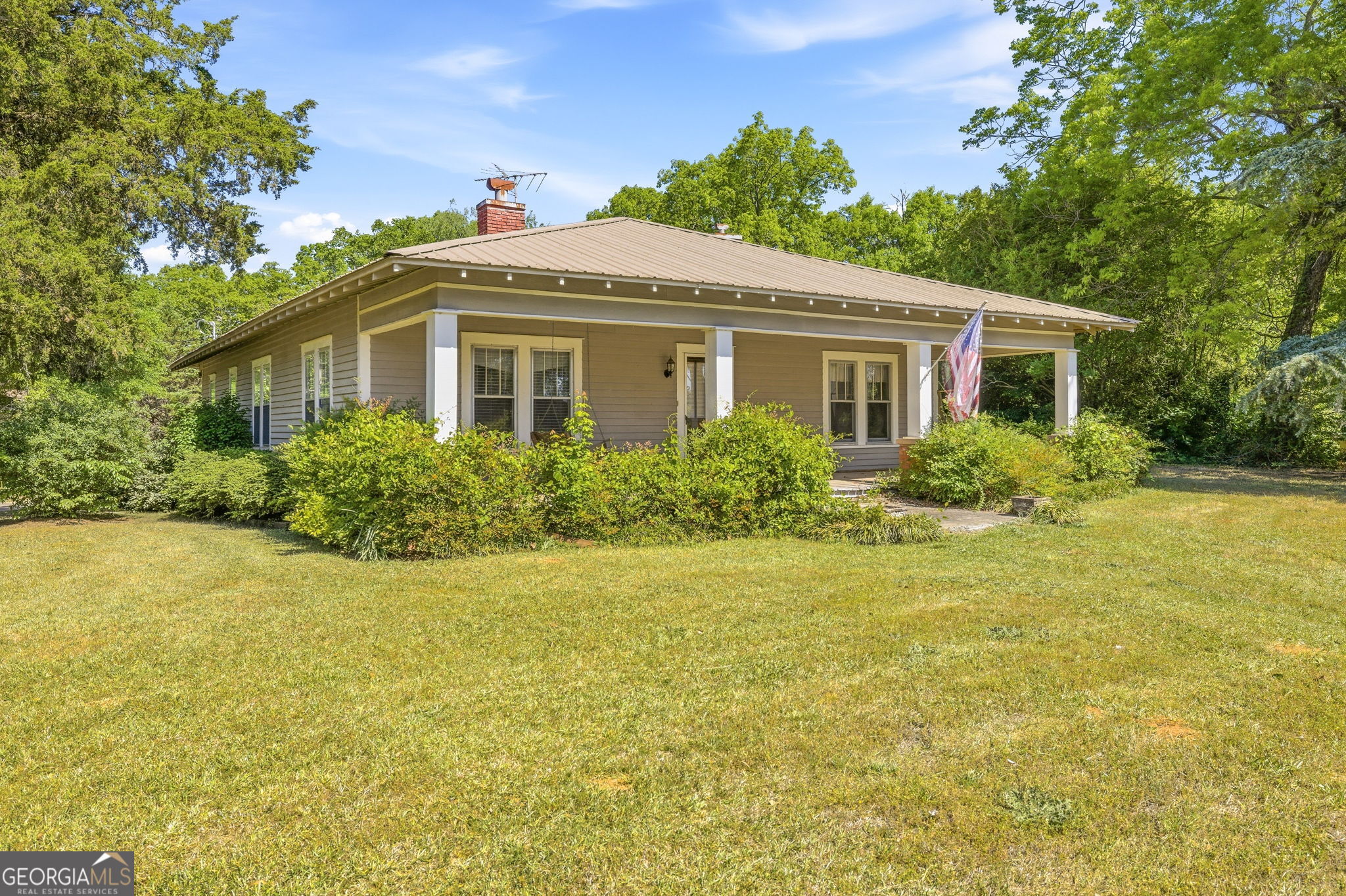 3213 Highway 326 Commerce, GA 30530 - Photo 3 of 40 a front view of house with yard and green space
