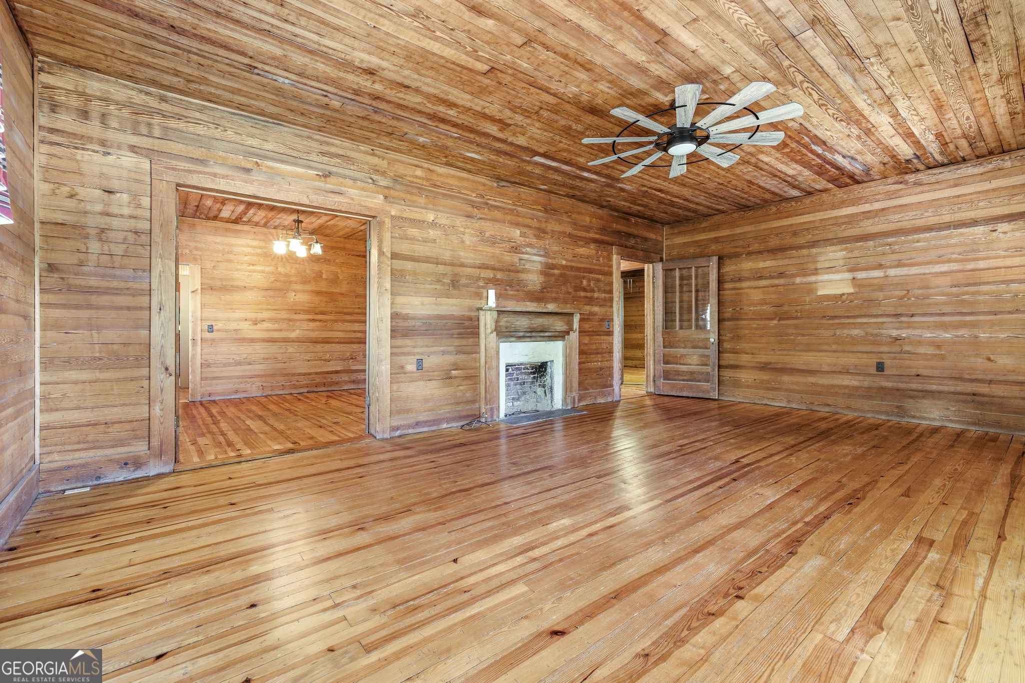 3213 Highway 326 Commerce, GA 30530 - Photo 9 of 40 a view of an empty room with wooden floor