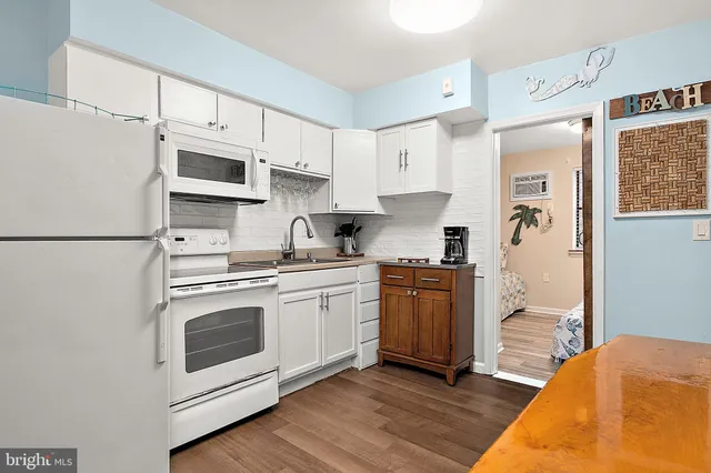 a bed room with a bed and a window