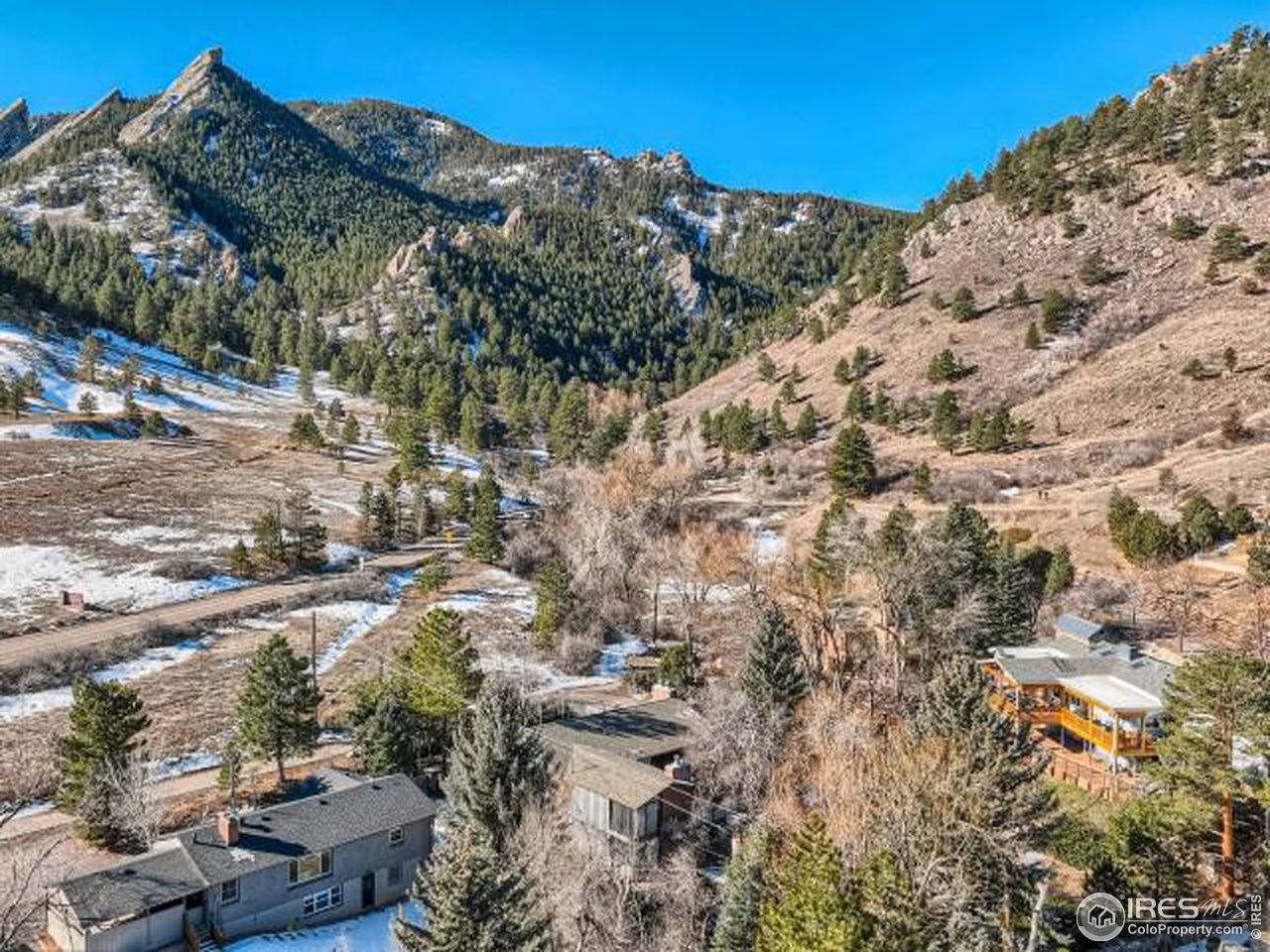 421 Baseline Road Boulder, CO 80302 - Photo 14 of 17 a view of a building with mountains space
